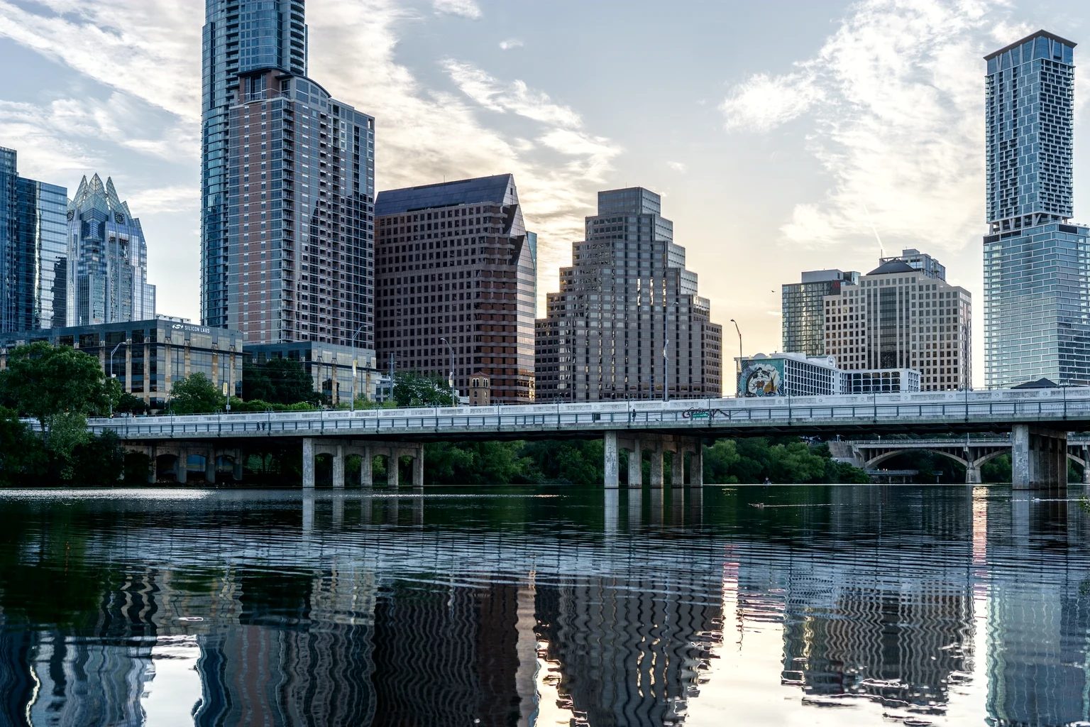 Austin's skyline over Lady Bird Lake, the First Street bridge across the water
