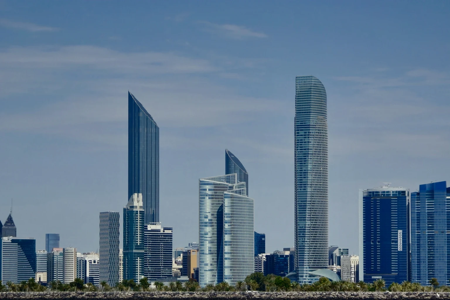 The towers of central Abu Dhabi seen across the water on a clear day