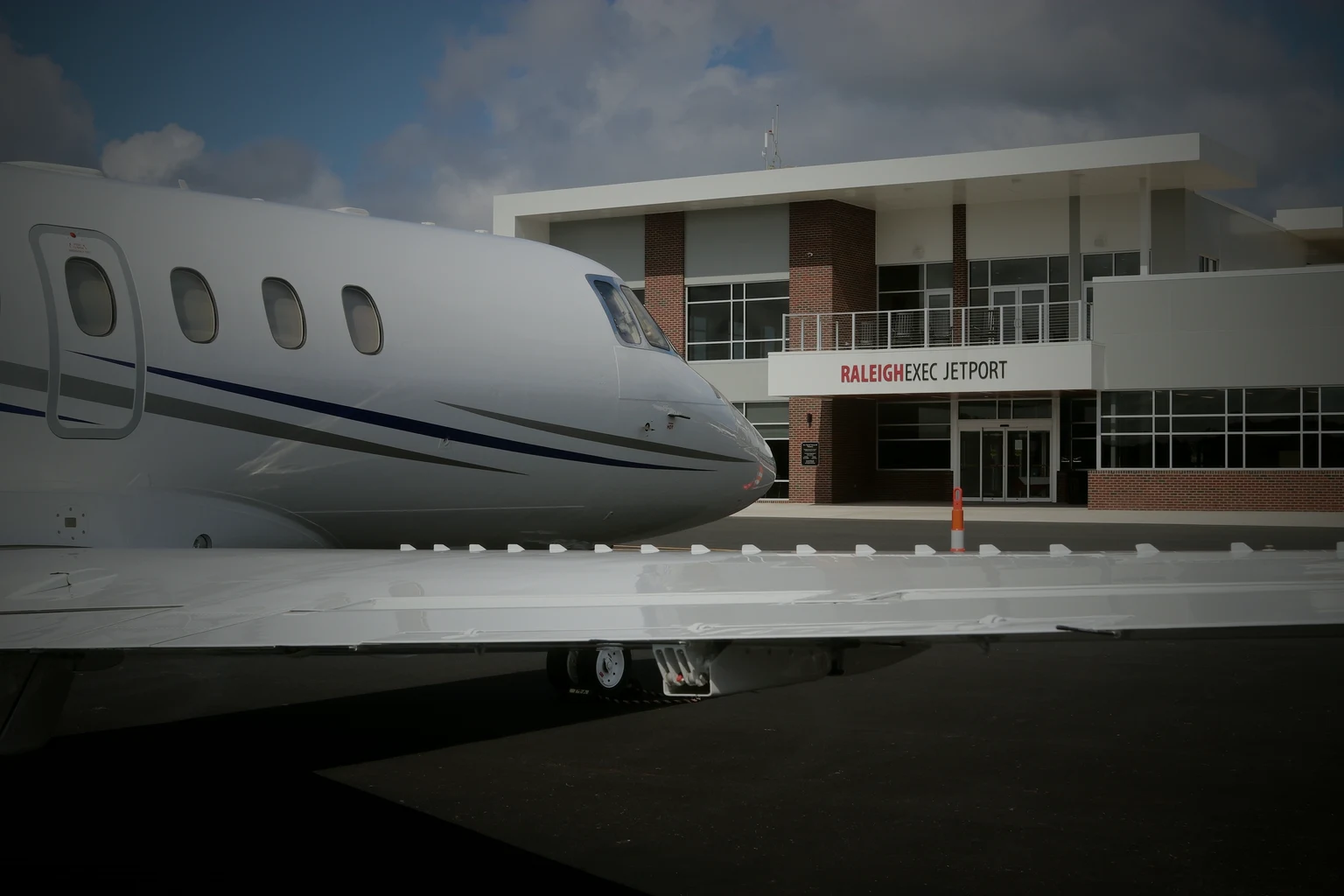 A business jet parked on the ramp in front of the Raleigh Exec Jetport private terminal in Sanford, North Carolina