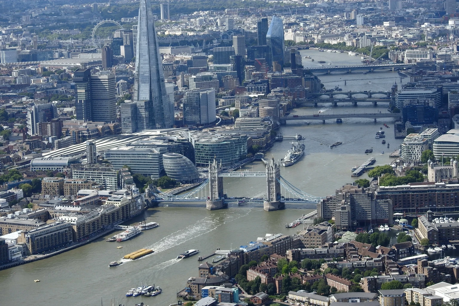 Tower Bridge, the Shard and the City of London seen from a helicopter above the Thames
