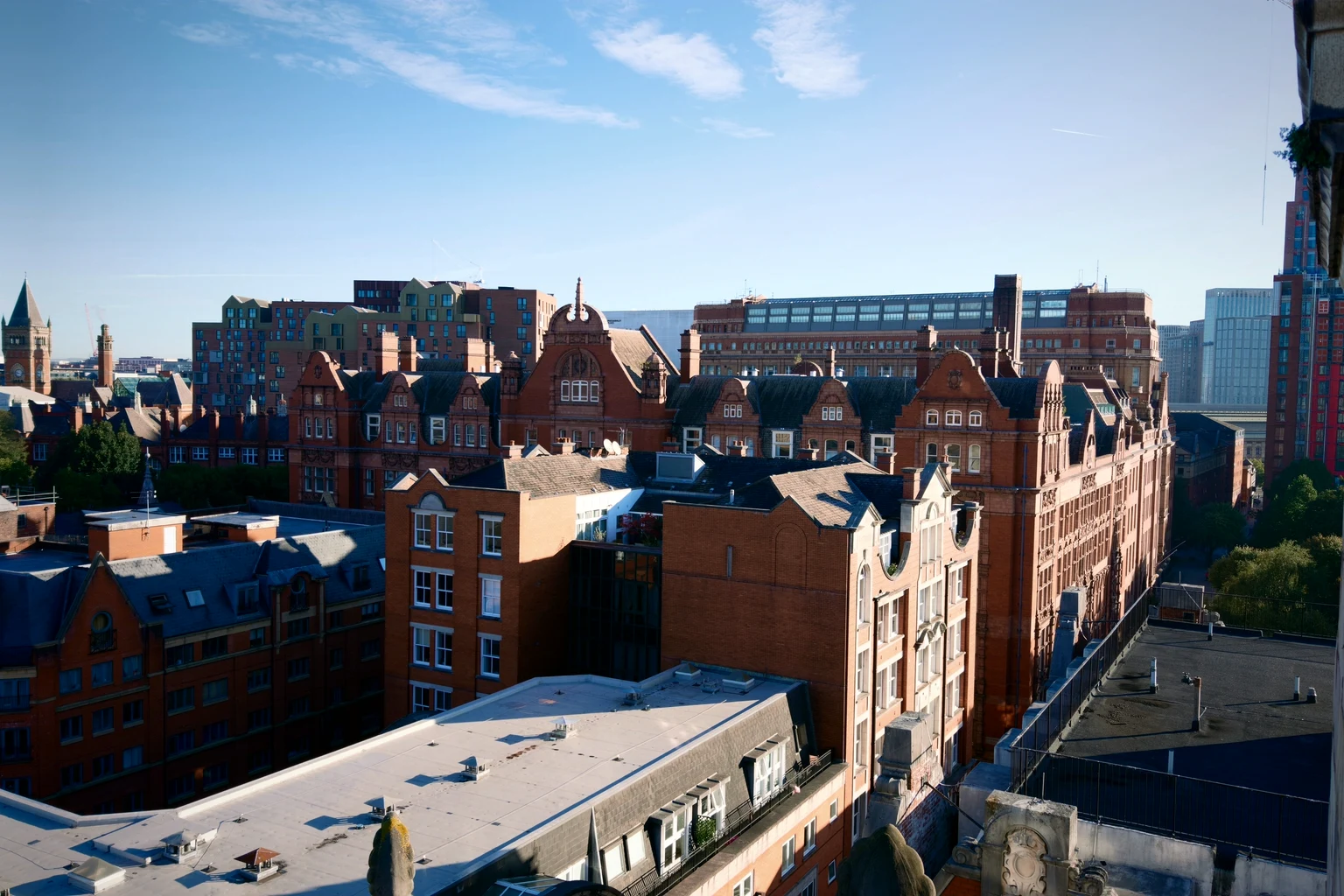 Red-brick warehouses of Manchester in evening light from above