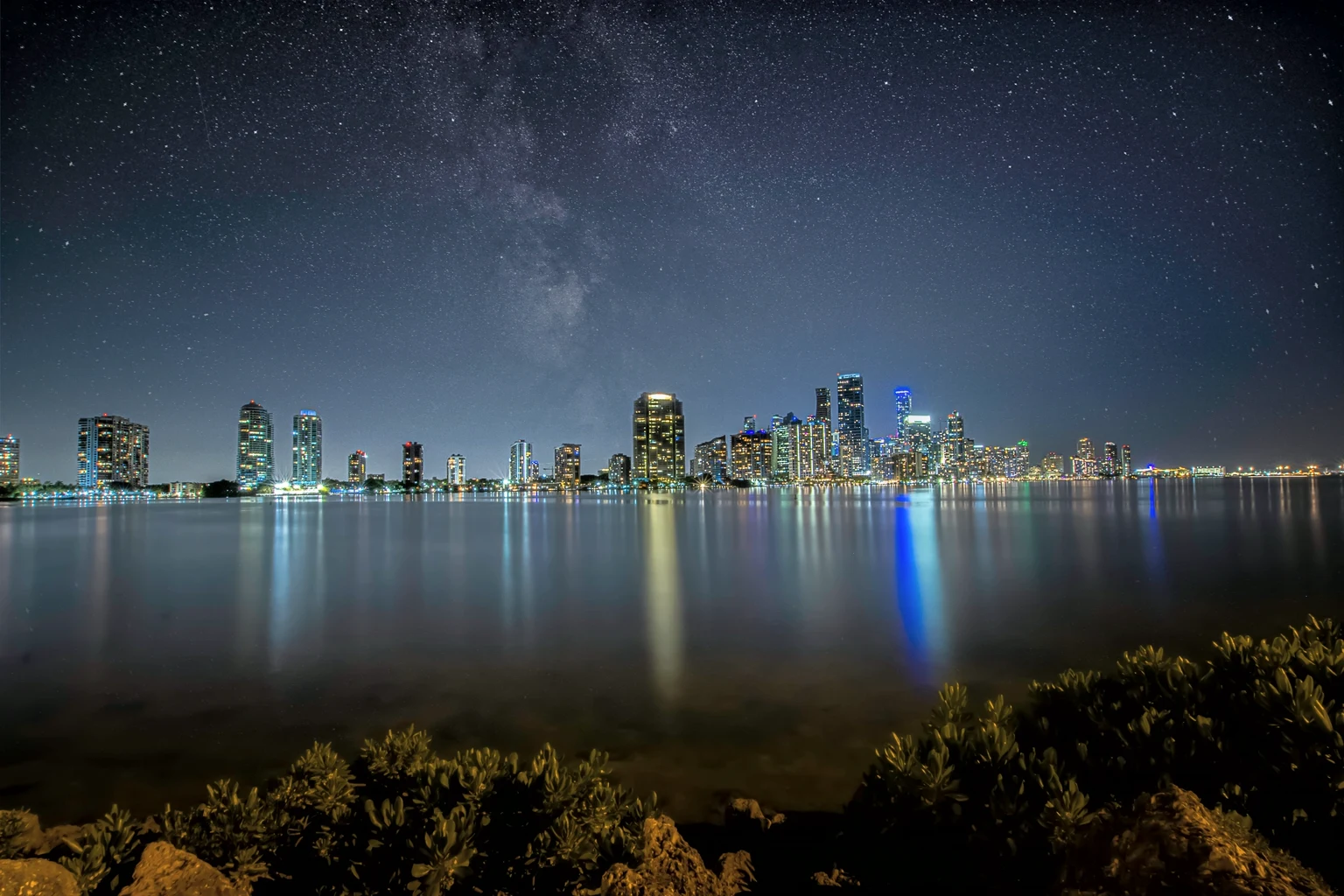 The Miami skyline at night across Biscayne Bay