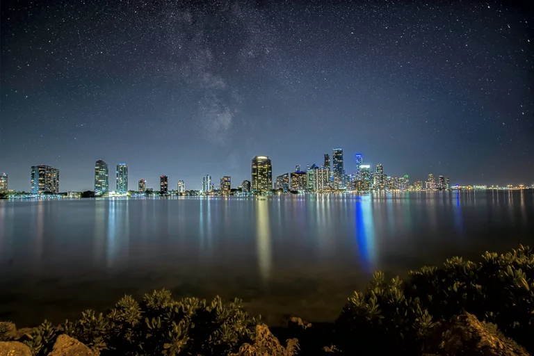 The Miami skyline at night across Biscayne Bay