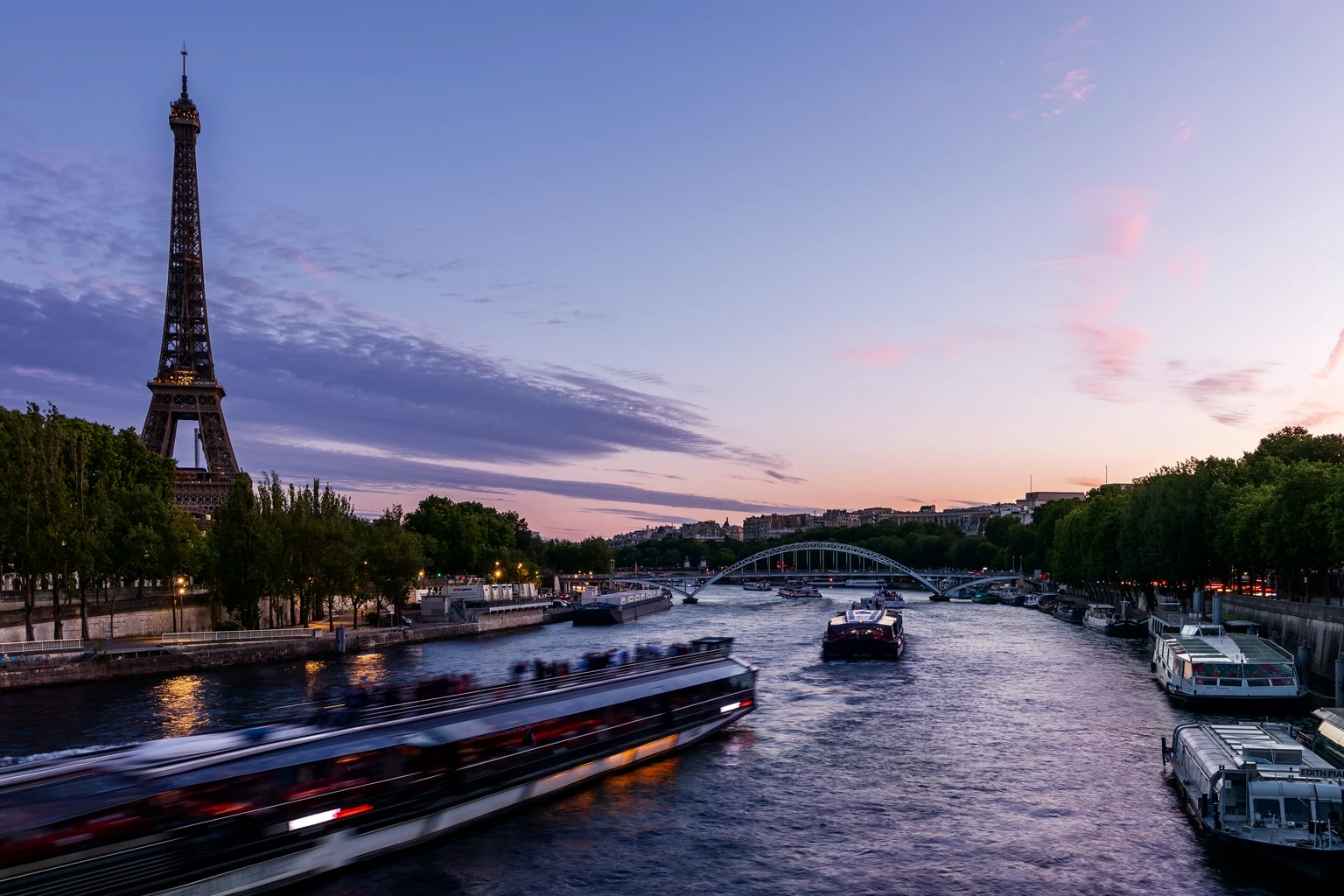 The Eiffel Tower and the Seine at sunset