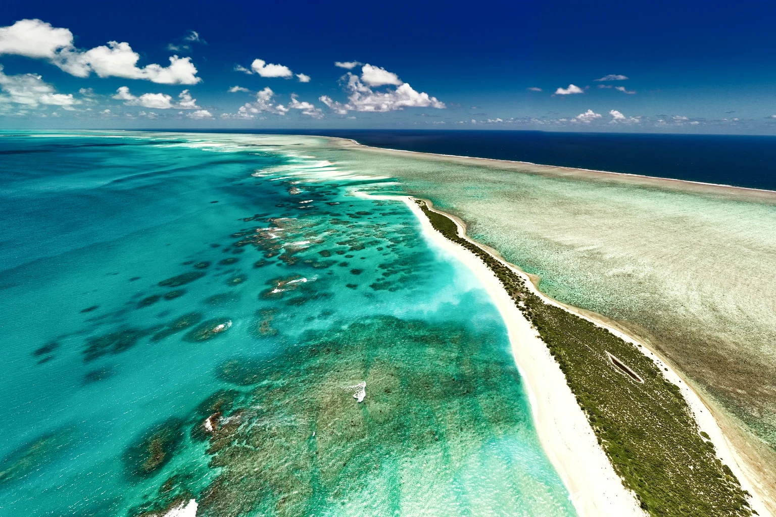 Turquoise channels and sandbanks of the Caicos Banks from the air
